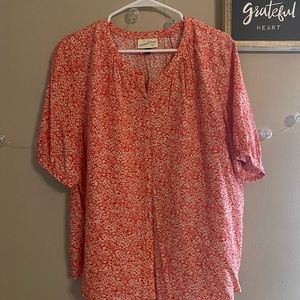 Red floral blouse